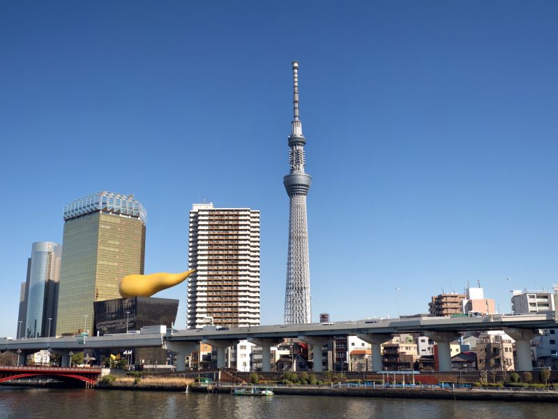 Tokyo Skytree Stands Above The Tokyo Cityscape With Blue Sky